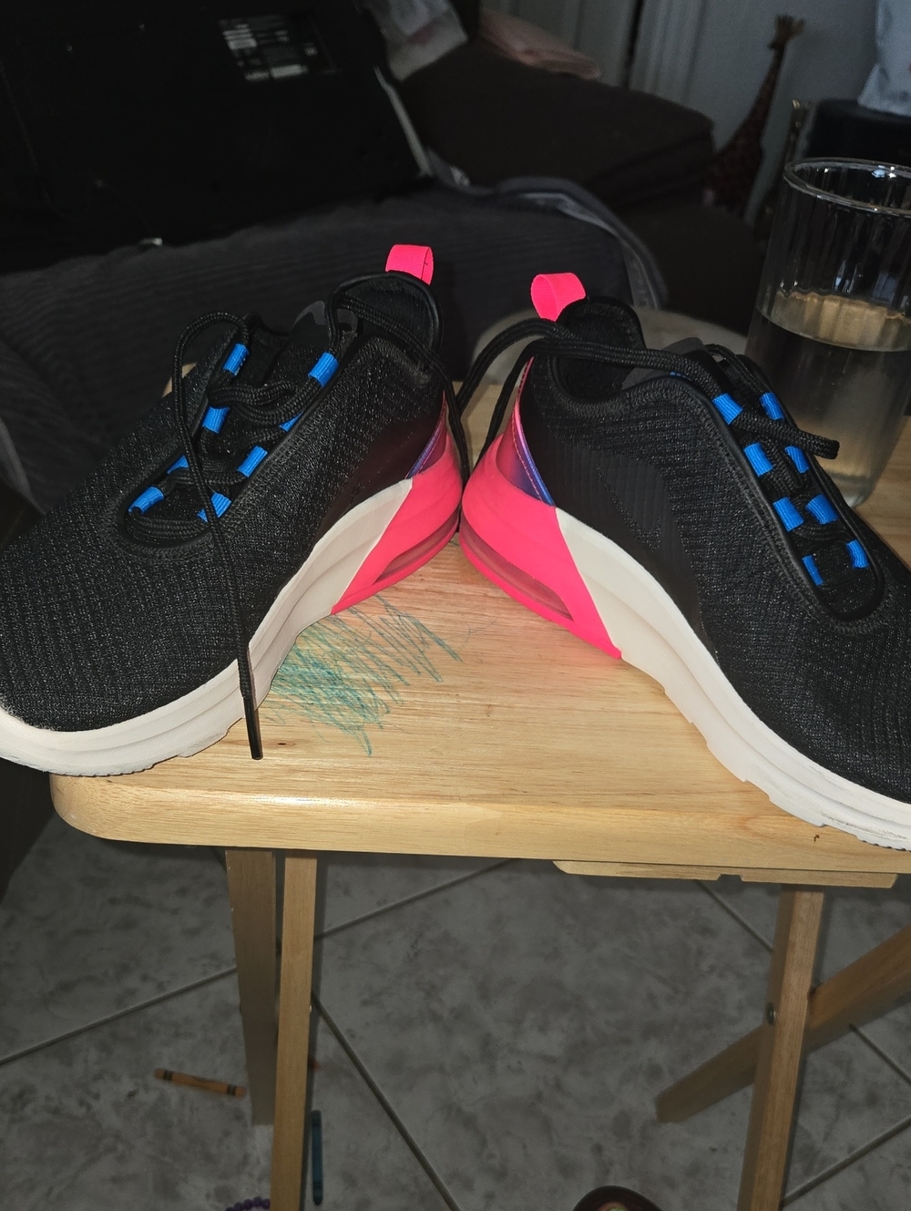 Nike Women's Black Knit Sneakers with Pink and Blue Accents